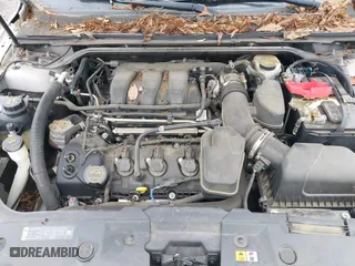2014 Ford Taurus SEL with VIN 1FAHP2H8XEG161271, listed as a IAAI auction lot 42105228 with 140,256 mi miles. Bid and sale history available at carsss.com. Image 10.