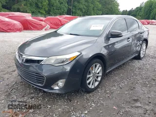 2013 Toyota Avalon XLE z VIN 4T1BK1EB0DU073513, wystawiony jako IAAI lot #42364719 z przebiegiem 208 242 mil mil oraz . Historia ofert i sprzedaży dostępna na DreamBid. Obrazek 2.