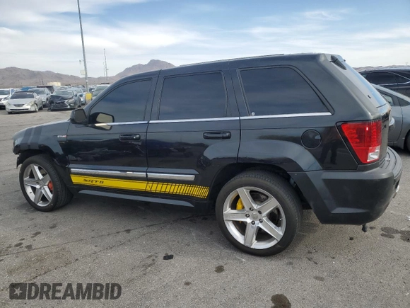 2008 Jeep Grand Cherokee SRT-8 with VIN 1J8HR78398C214004, listed as a Copart auction lot 48760375 with 165,318 mi miles and Salvage Title. Bid and sale history available at carsss.com. Image 2.