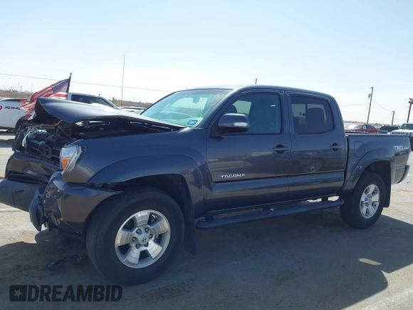 2014 Toyota Tacoma PreRunner with VIN 3TMJU4GN0EM164077, listed as a IAAI auction lot 41712542 with 69,443 mi miles. Bid and sale history available at carsss.com. Image 14.