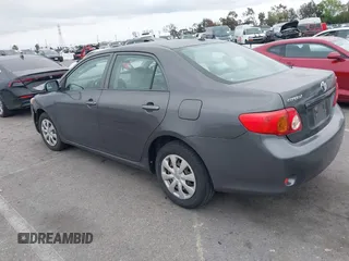 2009 Toyota Corolla with VIN JTDBL40E899066243, listed as a IAAI auction lot 41884292 with 219,338 mi miles. Bid and sale history available at carsss.com. Image 3.