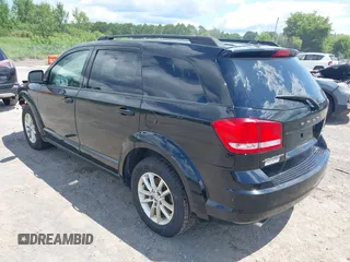 2017 Dodge Journey SXT z VIN 3C4PDDBG8HT512575, wystawiony jako IAAI lot #39710775 z przebiegiem 132 987 mil mil oraz . Historia ofert i sprzedaży dostępna na DreamBid. Obrazek 3.