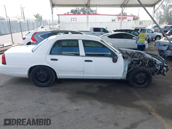 2009 Ford Police Interceptor with VIN 2FAHP71V29X129265, listed as a IAAI auction lot 42381382 with Not provided miles and . Bid and sale history available at DreamBid. Image 13.