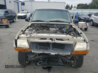 1999 Ford Ranger XLT with VIN 1FTZR15X6XPB58756, listed as a Copart auction lot 58839535 with 127,860 mi miles and Salvage title. Bid and sale history available at DreamBid. Image 5.