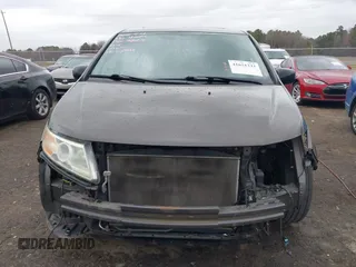 2012 Honda Odyssey Touring with VIN 5FNRL5H99CB071010, listed as a IAAI auction lot 41651233 with 186,913 mi miles. Bid and sale history available at carsss.com. Image 13.