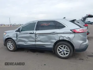 2022 Ford Edge SEL z VIN 2FMPK4J93NBA94793, wystawiony jako IAAI lot #41884687 z przebiegiem 57 372 mil mil oraz . Historia ofert i sprzedaży dostępna na DreamBid. Obrazek 14.
