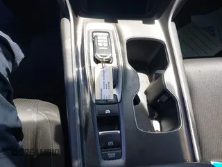 2020 Honda Accord with VIN 1HGCV3F11LA002534, listed as a IAAI auction lot 42537701 with 115,166 mi miles and . Bid and sale history available at DreamBid. Image 11.