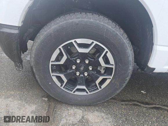 2023 Ford F-150 Lightning Pro z VIN 1FTVW1EL0PWG02840, wystawiony jako IAAI lot #42379448 z przebiegiem 52 710 mil mil oraz . Historia ofert i sprzedaży dostępna na DreamBid. Obrazek 45.