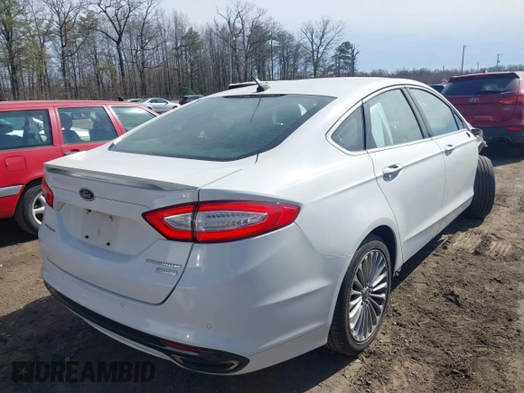 2015 Ford Fusion Titanium with VIN 3FA6P0K90FR207410, listed as a IAAI auction lot 41742534 with 171,008 mi miles. Bid and sale history available at carsss.com. Image 4.