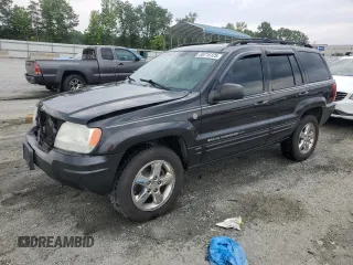 2004 Jeep Grand Cherokee Limited with VIN 1J4GW58N24C358693, listed as a Copart auction lot 59715125 with 186,766 mi miles and Salvage title. Bid and sale history available at DreamBid. Image 1.