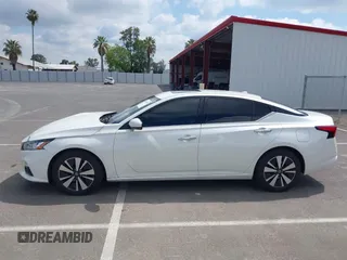 2019 Nissan Altima SL with VIN 1N4BL4EV9KC103050, listed as a IAAI auction lot 42139670 with 112,427 mi miles and . Bid and sale history available at DreamBid. Image 14.