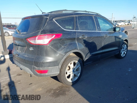 2013 Ford Escape SE with VIN 1FMCU9GX2DUC24504, listed as a IAAI auction lot 41846714 with 145,333 mi miles. Bid and sale history available at carsss.com. Image 4.