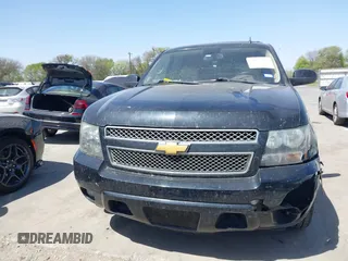 2012 Chevrolet Tahoe LT with VIN 1GNSCBE07CR229240, listed as a IAAI auction lot 41837063 with 219,901 mi miles and . Bid and sale history available at DreamBid. Image 12.