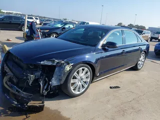 2013 Audi A8 L 4.0L with VIN WAUR2AFD3DN012893, listed as a IAAI auction lot 41209419 with 116,990 mi miles. Bid and sale history available at carsss.com. Image 19.