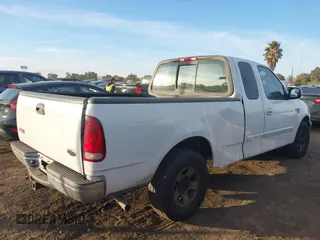 2003 Ford F-150 XL with VIN 2FTRX17L13CB04616, listed as a IAAI auction lot 41114369 with Not provided miles and . Bid and sale history available at DreamBid. Image 4.