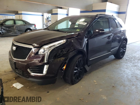 2021 Cadillac XT5 AWD Sport z VIN 1GYKNGRS5MZ165836, wystawiony jako Copart lot #77872264 z przebiegiem 46 065 mil mil oraz Szkoda całkowita • Salvage title. Historia ofert i sprzedaży dostępna na DreamBid. Obrazek 1.