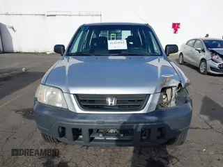 2000 Honda CR-V LX with VIN JHLRD184XYC054038, listed as a IAAI auction lot 41414445 with 294,210 mi miles. Bid and sale history available at carsss.com. Image 12.