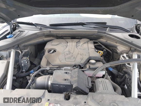 2022 Genesis GV70 2.5T with VIN KMUMADTB2NU065058, listed as a IAAI auction lot 41707351 with 77,831 mi miles and . Bid and sale history available at DreamBid. Image 10.