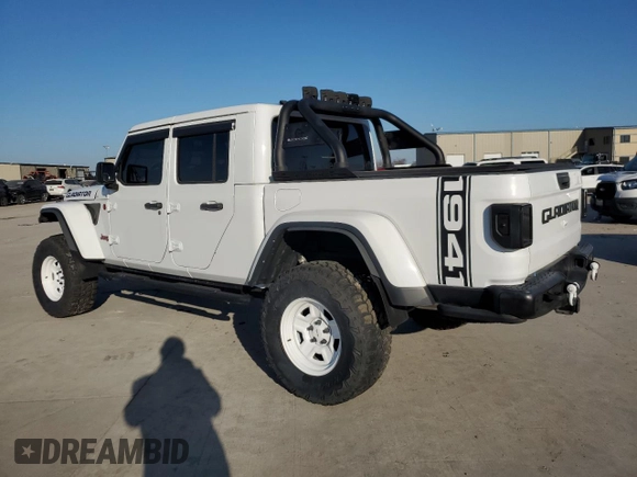 2022 Jeep Gladiator Rubicon with VIN 1C6JJTBG5NL152818, listed as a Copart auction lot 80095554 with 9,579 mi miles and Salvage title. Bid and sale history available at DreamBid. Image 2.