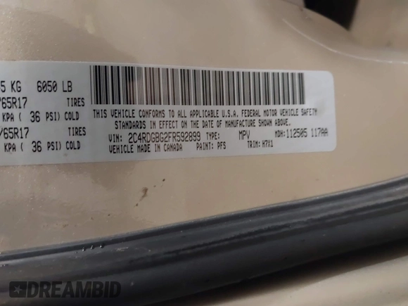 2015 Dodge Grand Caravan SE with VIN 2C4RDGBG2FR592899, listed as a IAAI auction lot 41309499 with 110,428 mi miles and . Bid and sale history available at DreamBid. Image 9.