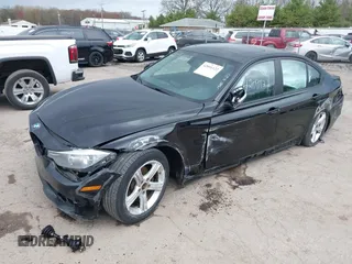 2014 BMW 3 Series 320i xDrive with VIN WBA3C3C51EF983320, listed as a IAAI auction lot 42091122 with 12,312 mi miles and . Bid and sale history available at DreamBid. Image 2.