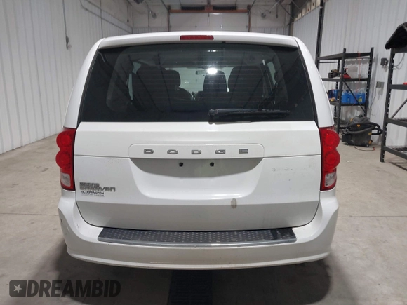 2016 Dodge Grand Caravan SE with VIN 2C4RDGBG1GR392484, listed as a IAAI auction lot 41663549 with 126,882 mi miles and . Bid and sale history available at DreamBid. Image 16.
