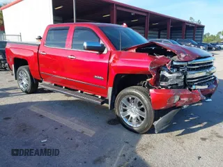 2018 Chevrolet Silverado 1500 High Country with VIN 3GCUKTEJ9JG135943, listed as a IAAI auction lot 41641275 with 83,361 mi miles and . Bid and sale history available at DreamBid. Image 1.
