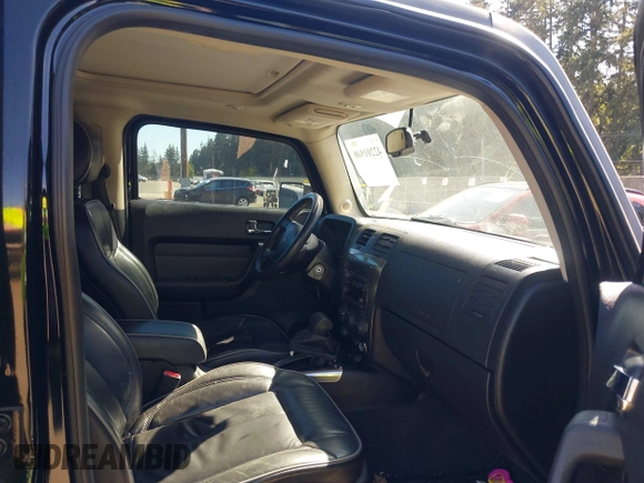 2007 Hummer H3 SUV with VIN 5GTDN13E378169059, listed as a IAAI auction lot 42201940 with 150,487 mi miles. Bid and sale history available at carsss.com. Image 5.