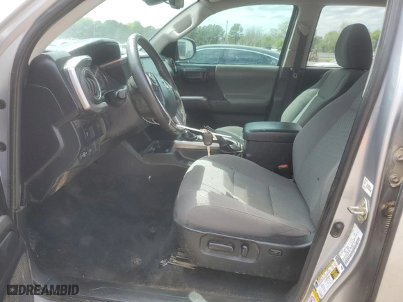 2020 Toyota Tacoma 4WD SR5 with VIN 3TMCZ5AN6LM310312, listed as a Copart auction lot 50162955 with 82,710 mi miles and Salvage Title. Bid and sale history available at carsss.com. Image 7.