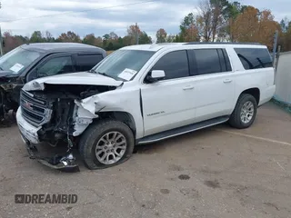 2019 GMC Yukon XL SLT with VIN 1GKS2GKC7KR165419, listed as a IAAI auction lot 40977930 with 167,195 mi miles and . Bid and sale history available at carsss.com. Image 19.