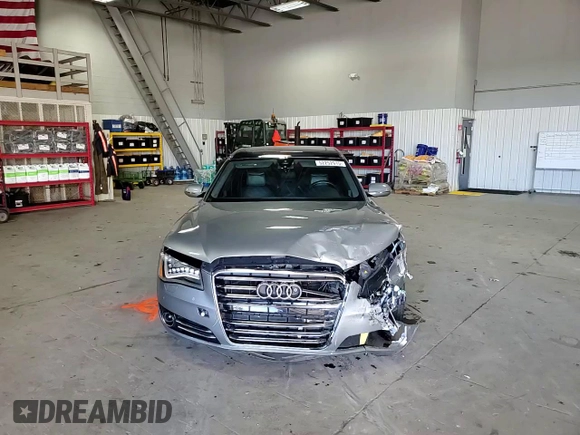 2012 Audi A8 z VIN WAURVAFD3CN025035, wystawiony jako Copart lot #52252915 z przebiegiem 71 312 mil mil oraz Szkoda całkowita • Salvage title. Historia ofert i sprzedaży dostępna na DreamBid. Obrazek 11.