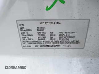 2021 Tesla Model Y Long Range with VIN 5YJYGDEE6MF082883, listed as a IAAI auction lot 42078807 with 64,953 mi miles. Bid and sale history available at carsss.com. Image 9.