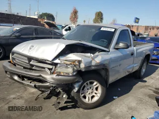 2002 Dodge Dakota with VIN 1B7FL16X72S632397, listed as a Copart auction lot 87450164 with Not Provided miles and Salvage Title. Bid and sale history available at carsss.com. Image 1.