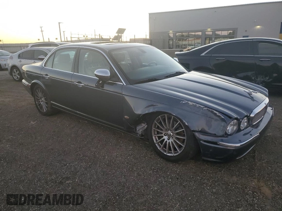 2007 Jaguar XJ with VIN SAJWA71B27SH17096, listed as a Copart auction lot 78863314 with 132,779 mi miles and Salvage Title. Bid and sale history available at carsss.com. Image 4.