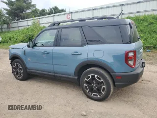 2022 Ford Bronco Sport Outer Banks z VIN 3FMCR9C61NRD00690, wystawiony jako Copart lot #61822235 z przebiegiem 10 635 mil mil oraz Czysty tytuł • Clean title. Historia ofert i sprzedaży dostępna na DreamBid. Obrazek 2.
