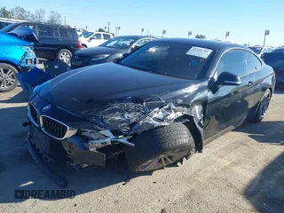 2014 BMW 4 Series 428i with VIN WBA3N7C55EK221259, listed as a IAAI auction lot 41322781 with 100,274 mi miles and . Bid and sale history available at carsss.com. Image 17.