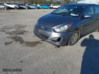 2014 Hyundai Accent GS with VIN KMHCT5AE6EU174338, listed as a IAAI auction lot 41096955 with 49,614 mi miles. Bid and sale history available at carsss.com. Image 6.