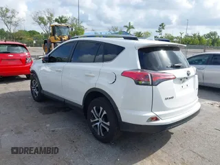 2017 Toyota RAV4 LE with VIN JTMZFREV3HJ143416, listed as a IAAI auction lot 41861981 with 115,241 mi miles and . Bid and sale history available at DreamBid. Image 3.