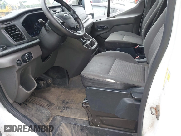 2020 Ford Transit Cargo with VIN 1FTBR3X83LKB51984, listed as a IAAI auction lot 42567147 with 209,178 mi miles and . Bid and sale history available at DreamBid. Image 14.
