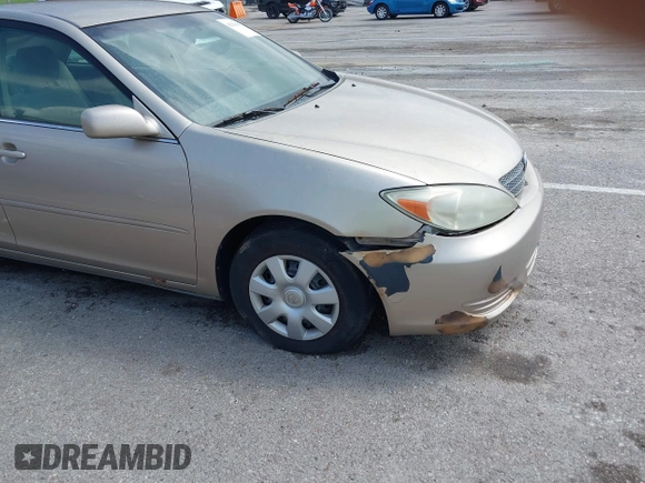 2003 Toyota Camry LE with VIN 4T1BE32K13U243738, listed as a IAAI auction lot 42120647 with Not Provided miles and . Bid and sale history available at DreamBid. Image 12.
