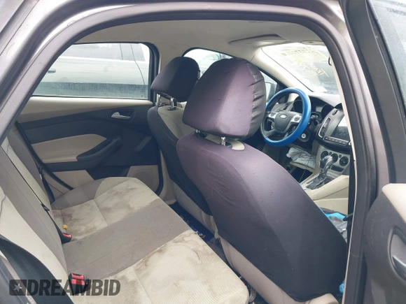 2013 Ford Focus SE z VIN 1FADP3F29DL125404, wystawiony jako IAAI lot #41957990 z przebiegiem 187 000 mil mil oraz . Historia ofert i sprzedaży dostępna na DreamBid. Obrazek 8.