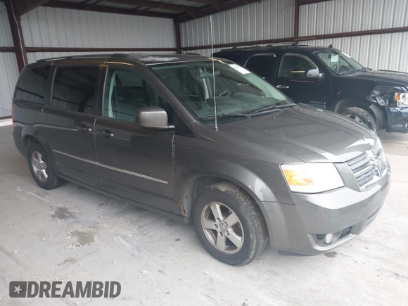 2010 Dodge Grand Caravan SXT z VIN 2D4RN5D11AR220105, wystawiony jako IAAI lot #42299610 z przebiegiem 223 842 mil mil oraz . Historia ofert i sprzedaży dostępna na DreamBid. Obrazek 1.