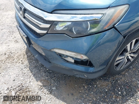 2018 Honda Pilot EX-L with VIN 5FNYF6H53JB006219, listed as a IAAI auction lot 42469399 with 134,214 mi miles and . Bid and sale history available at DreamBid. Image 6.