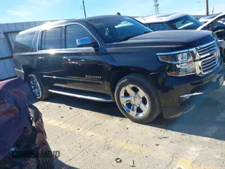 2015 Chevrolet Suburban LTZ with VIN 1GNSCKKC3FR249956, listed as a IAAI auction lot 41306605 with 122,942 mi miles and . Bid and sale history available at DreamBid. Image 13.