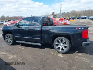 2018 Chevrolet Silverado 1500 with VIN 1GCVKSEC3JZ125571, listed as a IAAI auction lot 41982881 with 58,410 mi miles and . Bid and sale history available at DreamBid. Image 14.