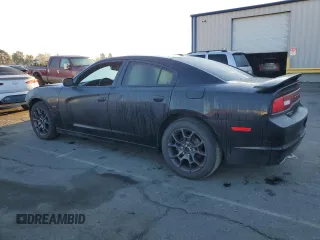 2011 Dodge Charger RT Plus with VIN 2B3CM5CT6BH517548, listed as a Copart auction lot 82219834 with 114,134 mi miles and Salvage Title. Bid and sale history available at carsss.com. Image 2.