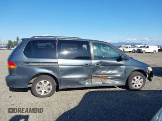 2003 Honda Odyssey EX-L with VIN 5FNRL18993B039943, listed as a IAAI auction lot 41742829 with 227,581 mi miles and . Bid and sale history available at DreamBid. Image 13.