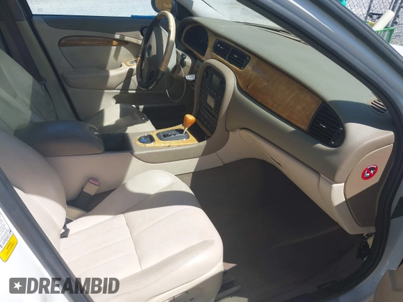 2003 Jaguar S-Type with VIN SAJEA01U93HM89560, listed as a IAAI auction lot 42115289 with 236,905 mi miles and . Bid and sale history available at DreamBid. Image 5.