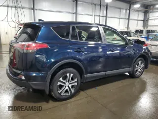 2017 Toyota RAV4 LE with VIN JTMBFREV6HJ165878, listed as a Copart auction lot 58940845 with 120,897 mi miles and Salvage title. Bid and sale history available at DreamBid. Image 3.