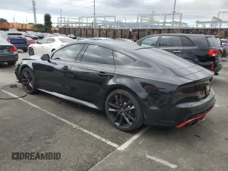 2016 Audi RS 7 Prestige z VIN WUAW2AFC4GN901559, wystawiony jako Copart lot #43982414 z przebiegiem 54 386 mil mil oraz . Historia ofert i sprzedaży dostępna na DreamBid. Obrazek 2.